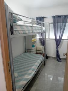 Ένα ή περισσότερα κρεβάτια σε δωμάτιο στο Quinta Veigas