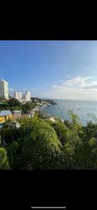 a view of a body of water with a city at Kitnet compacta in Salvador
