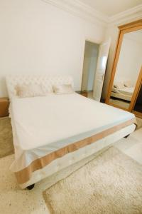 Cama o camas de una habitación en Joli Appartement Hedi Naouira el Naser