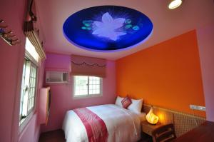 Postel nebo postele na pokoji v ubytování Siaowan Homestay