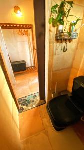 a view of a room with a bathroom with a window at Preá Chalé Tsuru in Cruz +15 photos