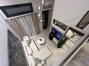 TV a/nebo společenská místnost v ubytování ANAVASI Loft SUITE