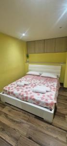 Кровать или кровати в номере Casa vacanze Harmonie