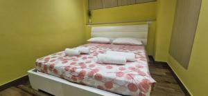 Ένα ή περισσότερα κρεβάτια σε δωμάτιο στο Casa vacanze Harmonie