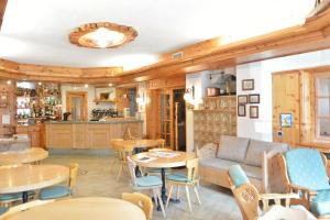 Posedenie v ubytovaní Hotel Garnì al Plan