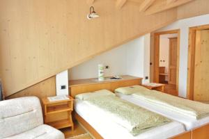 Posteľ alebo postele v izbe v ubytovaní Hotel Garnì al Plan + 37 fotografií