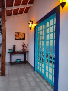 Et tv og/eller underholdning på Casa do Aconchego OFICIAL