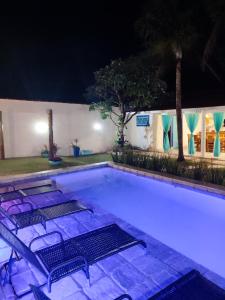 Swimmingpoolen hos eller tæt på Casa do Aconchego OFICIAL + 18 billeder