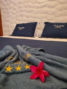 En eller flere senge i et værelse på Casa do Aconchego OFICIAL