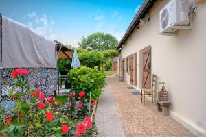 Κήπος έξω από το Chambre D'hotes Les Tuilières