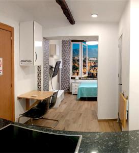 En eller flere senge i et værelse på Apartamento La Cueva