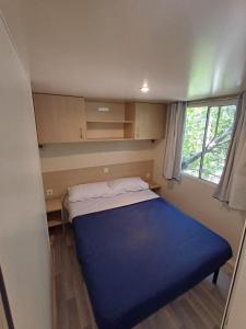 Ένα ή περισσότερα κρεβάτια σε δωμάτιο στο Mobile Home Elena