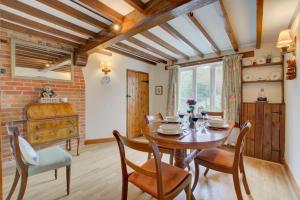 Et opholdsområde på Camberley Cottage