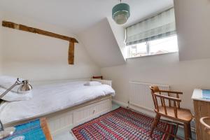 Postel nebo postele na pokoji v ubytování Anchor Cottage
