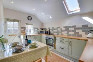 Kuchyň nebo kuchyňský kout v ubytování South Lodge + 5 fotografií