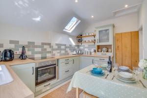 Kuchyň nebo kuchyňský kout v ubytování South Lodge