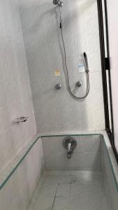 a shower with a glass floor in a bathroom at casa en cuernavaca in Cuernavaca +23 photos