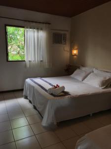 Postel nebo postele na pokoji v ubytování Cabana Eco Resort