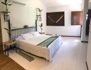 Postel nebo postele na pokoji v ubytování Cabana Eco Resort