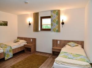 Postel nebo postele na pokoji v ubytování Landhotel Zum Adler