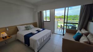 Cama ou camas em um quarto em Makia Beach Experience by La Playa mais 127 fotos