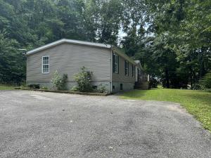 a small house with a driveway in front of it at Ravens Eye Retreat in Cherokee