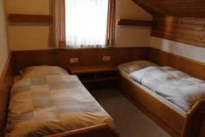 Postel nebo postele na pokoji v ubytování Landhaus Stocker