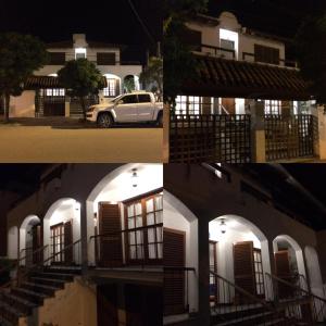 un edificio con un coche aparcado delante en Casa Recalada 5 dormitorios, en Monte Hermoso