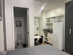 Kuchyň nebo kuchyňský kout v ubytování Studio Novo Brás