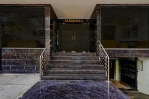 a set of stairs in front of a building at Super Townhouse OAK Clove Boutique Hotel Rajaji Nagar Near Lulu Mall Bengaluru in Bengaluru