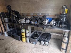 a shelf with helmets and other items on it at KREIDESEE 47 - Hemmoor in Hemmoor +19 photos