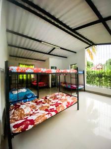 a bedroom with two bunk beds in a room at La Juanita in Melgar