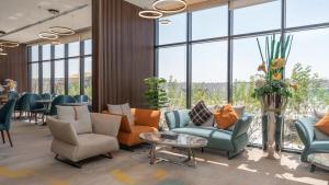 Χώρος καθιστικού στο Rosa Grand Hotel