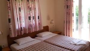 A bed or beds in a room at Villa Filia std