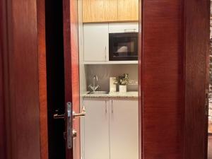 Η κουζίνα ή μικρή κουζίνα στο Historic Arch Apartment - Karlova Street +11 φωτογραφίες