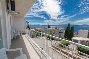 a balcony with a view of the ocean at Apartment Anne in Crikvenica