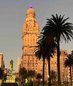 a tall building with a dome on top of it at Salvo 1928 in Montevideo