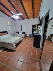 Ένα ή περισσότερα κρεβάτια σε δωμάτιο στο Casa de Campo Los Platanos +6 φωτογραφίες