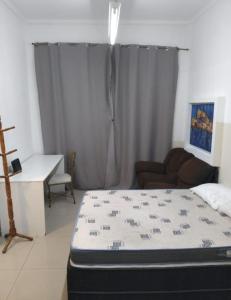 Una cama o camas en una habitación de Casa Studio Mega - Garagem Priv - Esp Térreo - WiFi 300 Megas - Home Office a 200 mts Praia da Pompéia 35 fotos más