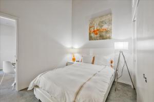 Giường trong phòng chung tại Global Luxury Suites Downtown San Diego +15 ảnh