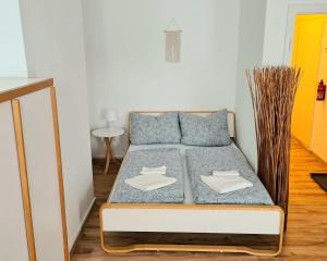 Katil atau katil-katil dalam bilik di 1 Zimmer Gold Studio in der City