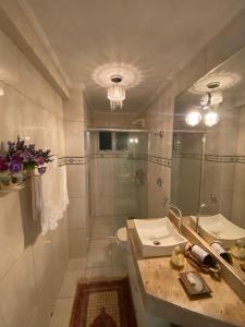 Ένα μπάνιο στο Apartamento Centro Araranguá