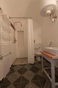 Koupelna v ubytování Plitzner Belvárosi Apartmanház