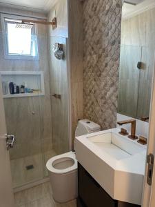 Photo de la galerie de l'établissement Apartamento com suíte e vista para o mar, à Vila Velha