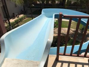 a slide on top of a stair railing at Beach Living, Frente mar, Vizinho B Park - Oficial in Mangabeira +290 photos