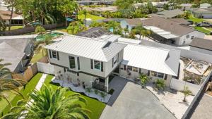 an aerial view of a house with a white roof at Doral Beach in Tampa