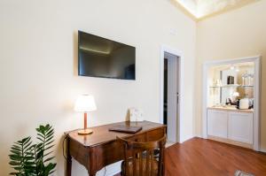 Televízia a/alebo spoločenská miestnosť v ubytovaní Turenum Apartment B&B