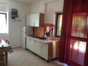 A kitchen or kitchenette at Villa Marilena