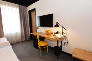 Voodi või voodid majutusasutuse The Loop Hotel toas
