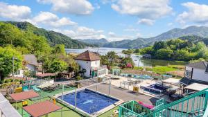 an aerial view of a house with a swimming pool at Gapyeong Four Season Pension in Gapyeong